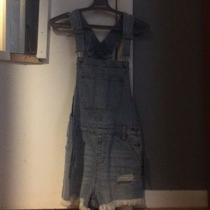 light blue overalls with fringe bottoms and rips!!